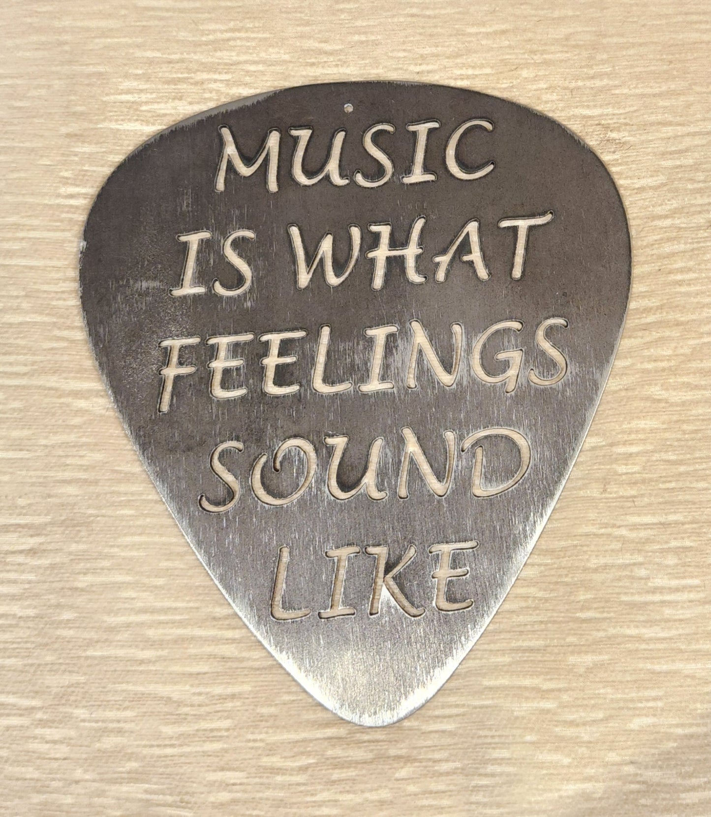 Brushes Guitar Pick Sign