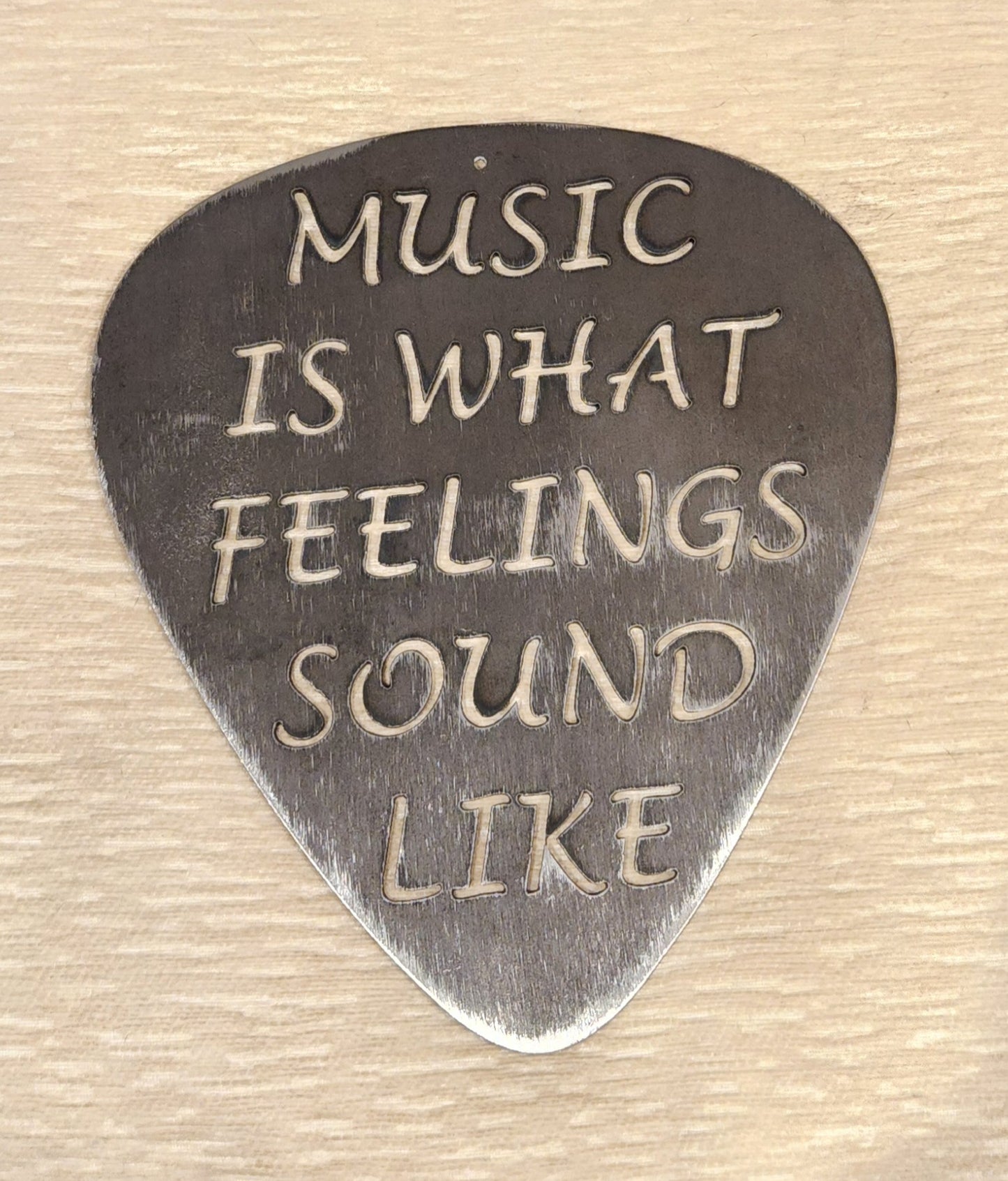 Brushes Guitar Pick Sign