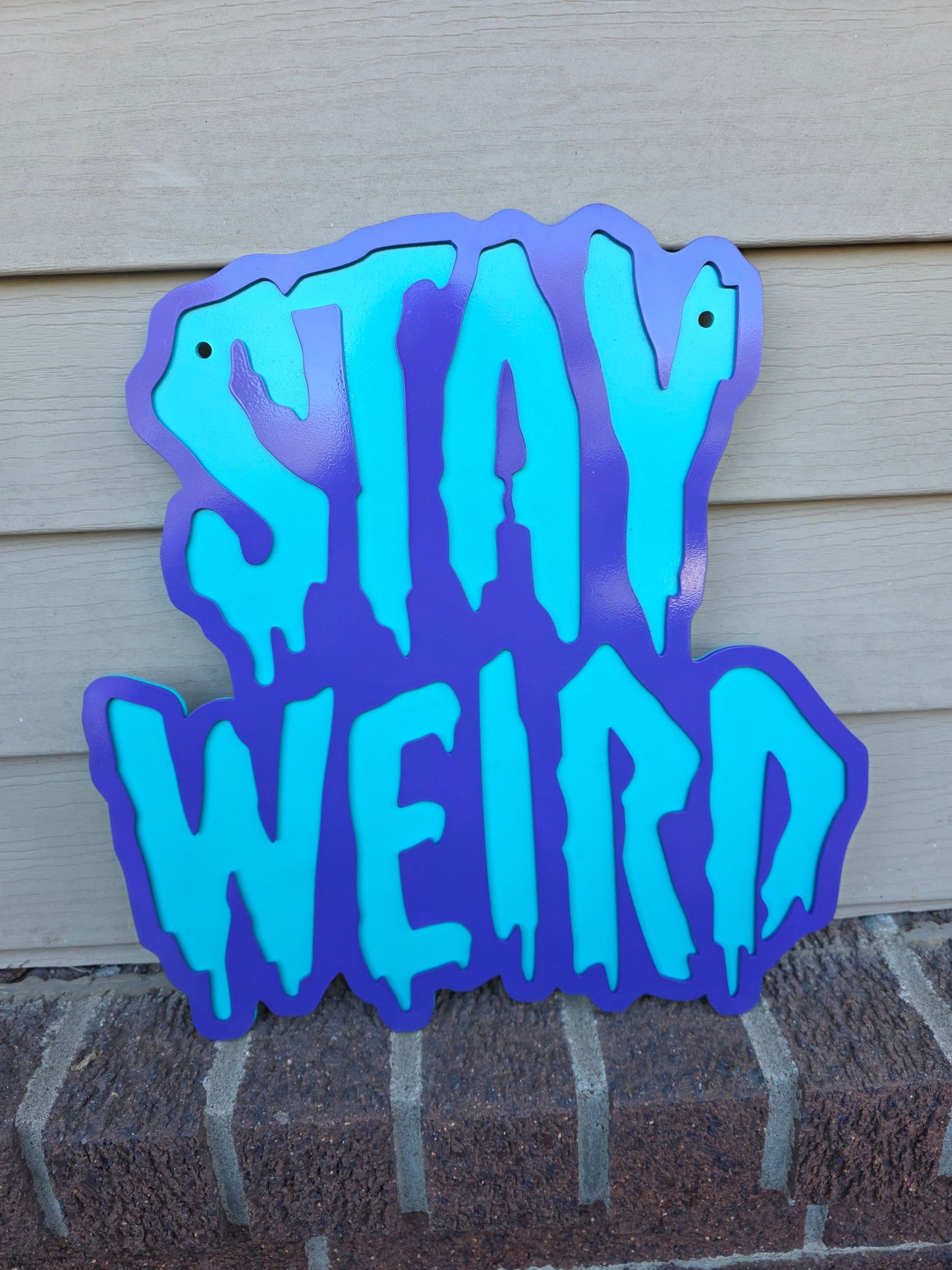 Stay wierd sign